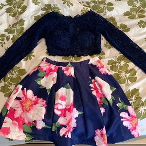A floral and navy formal dress fit to shine at any event!